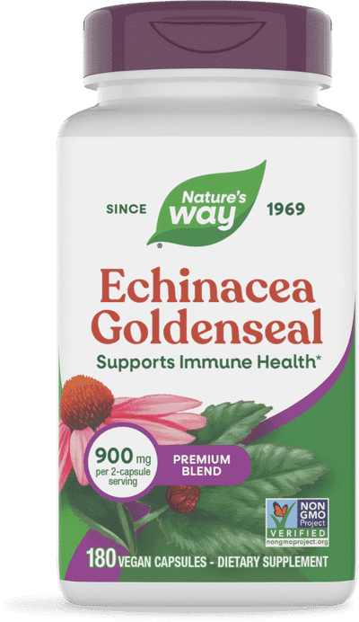 A bottle of Ashwagandha dietary supplement with 180 vegan capsules, featuring label details and images of the ashwagandha plant.